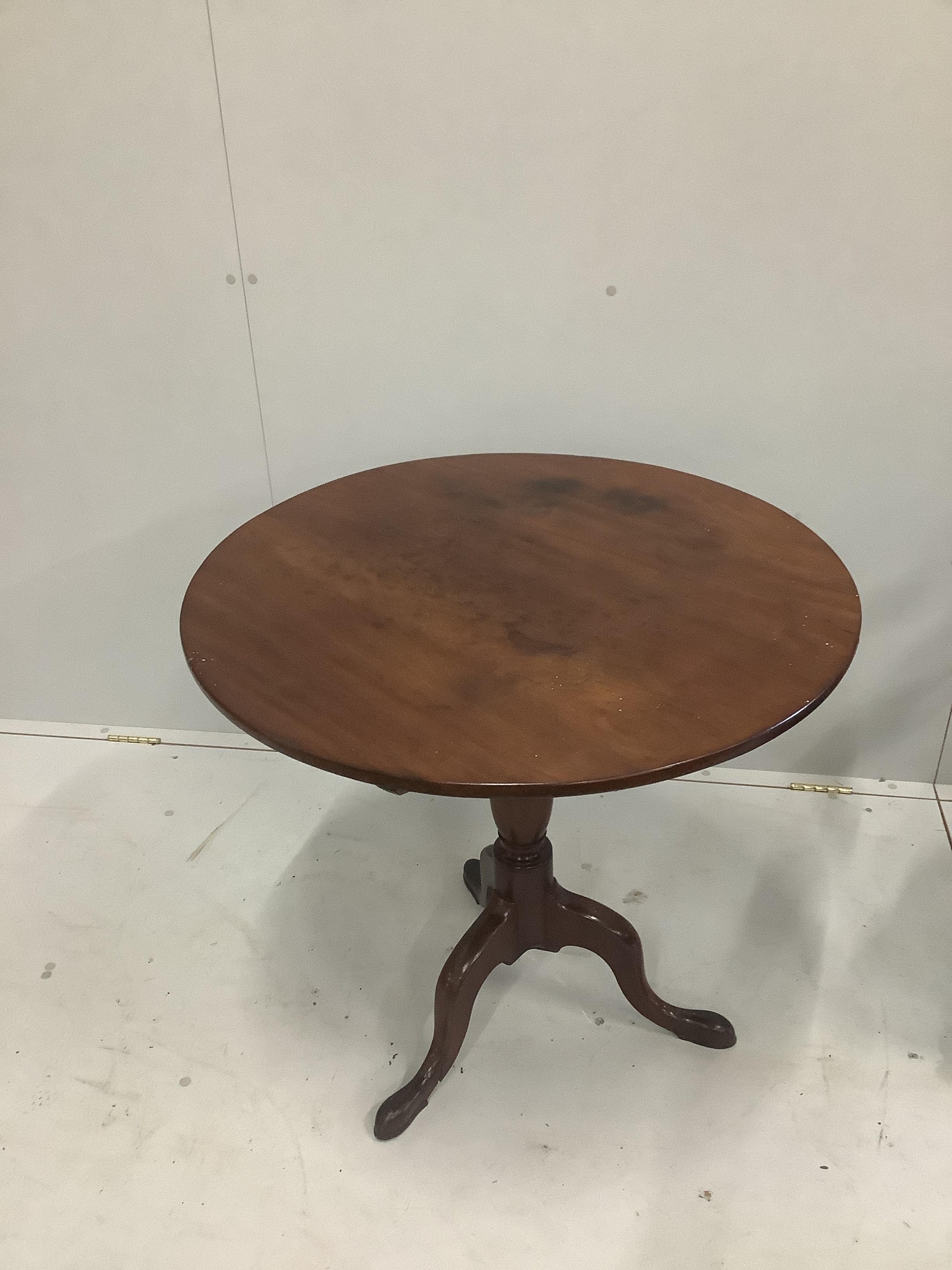 A George III mahogany tilt top tripod table, diameter 77cm